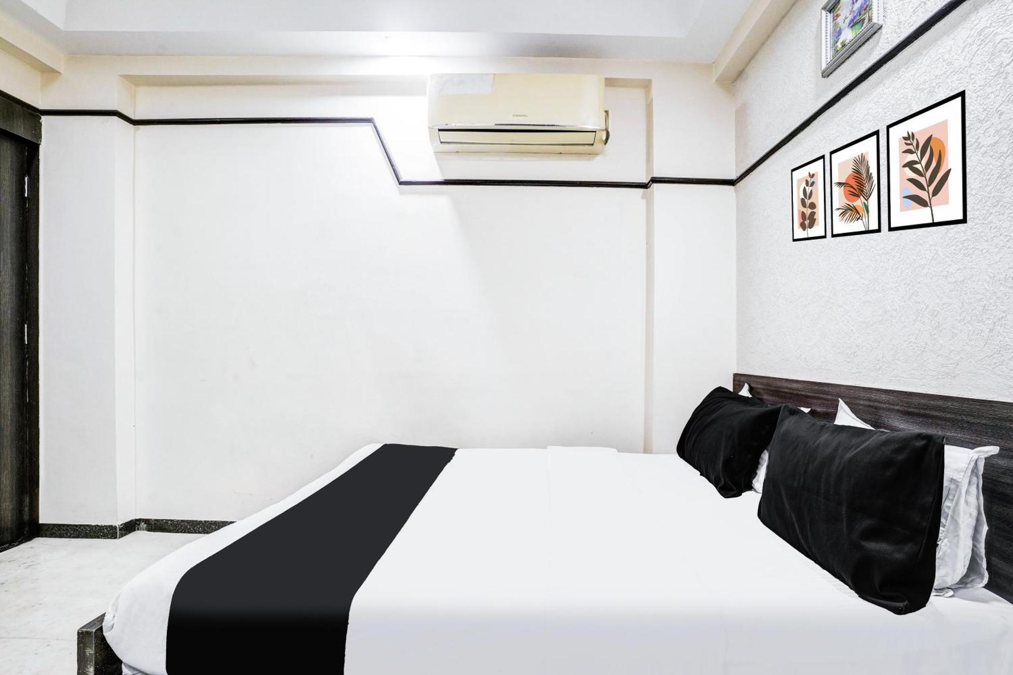 Super Collection O Ashram Road Near Sardar Bridge Formerly Hotel Apple Inn อาเมดาบัด ภายนอก รูปภาพ